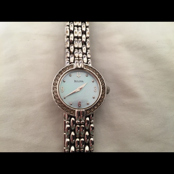 Bulova women’s watch with diamonds around face - Picture 2 of 9